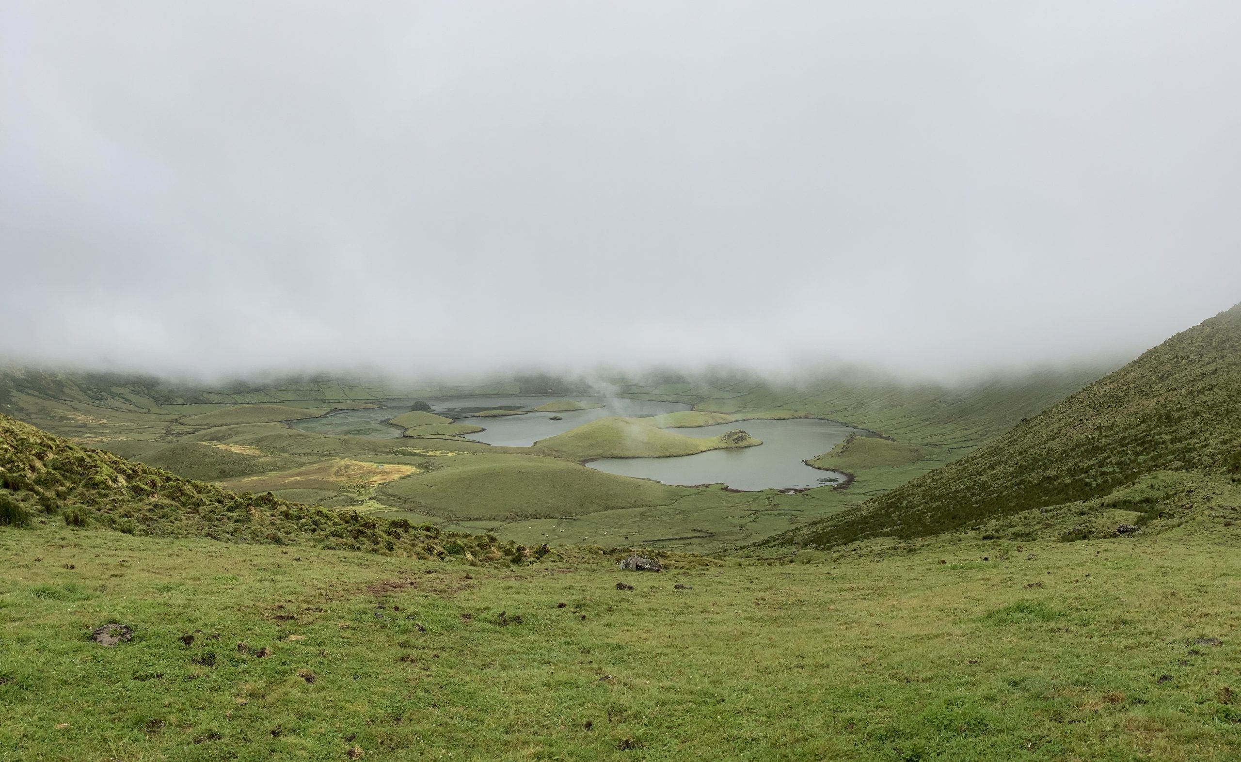 Melissa Masvaleix | The beautiful Caldeirão in Corvo island with clouds